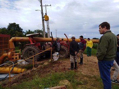Instalan en Pilar 12 motobombas para acelerar desagote de barrios inundados
