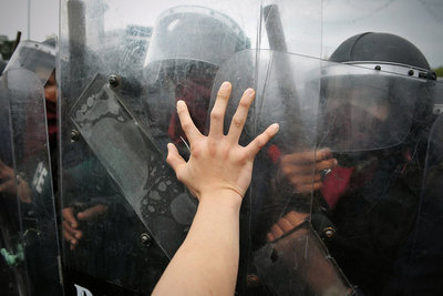 Unstable Situations Require Police In Riot Gear Face Off With Protesters At Zone 5